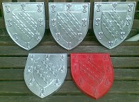 Cast aluminium shields for Exeter College Oxford.