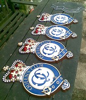 Queen's Club badges. Cast aluminium badges, 18in high, for the Queen's Club tennis club gates.