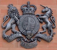 7ft 5in/2.25m high British royal coat of arms GRP/cold-cast aluminium Manchester Magistrates' Court.